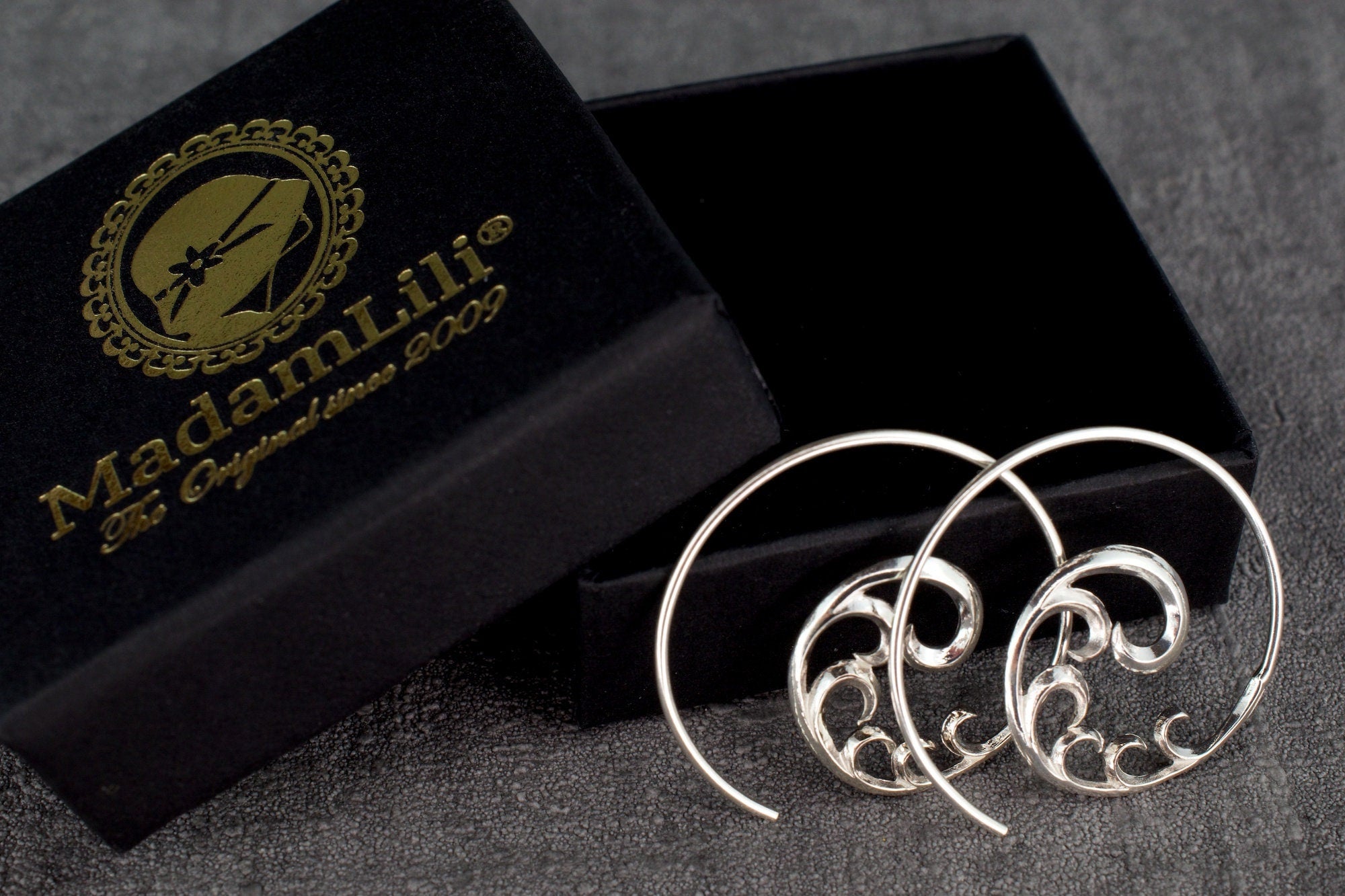 Sterling spiral silver earrings - small, by New Zealand jewellery designer  Nick Feint, Stone Arrow.